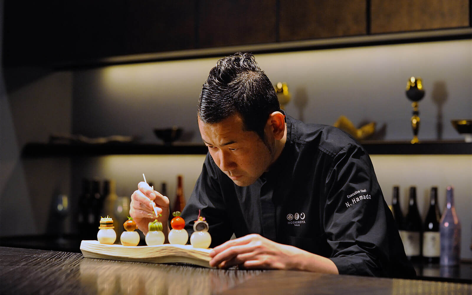 Chef Hamada displaying beautiful artwork of the culinary world.