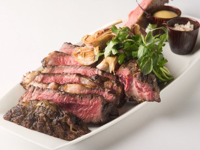 Savor the dry-aged beef at an authentic steakhouse