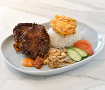 SINKIES_Nasi Lemak - Singapore's national dish! Enjoy its complex flavors.
