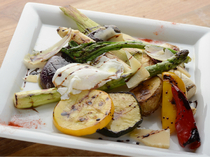 PACE ITALIAN LOUNGE_Multicolored grilled vegetable plate with a poached egg