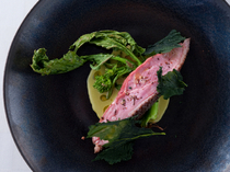 Mondo_Charcoal-grilled Burgaud duck with cima di rapa contorno (side of turnip tops)