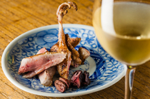 Yakitori Imai_Charcoal grilled quail Our popular dish is carefully grilled immediately after it is dressed