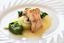 Restaurant Vascu_[Grilled Rockfish with Lemon Butter Sauce] Served with vegetables boiled in a soup stock of cured ham