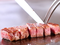 Beefsteak Kawamura Sannomiya main branch_[Kobe Beef Steak] being grilled on an iron griddle in front of you