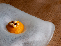Au Bord d'Eau Fukuoka_[100% Organic Carrot and Local Mandarin Orange Puree], made using peel and all to infuse the dish with the ingredients' inherent flavors.