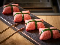 Yakiniku RIKIO_Tied Beef Tongue - The sliced tongue is wrapping green onion sauce for a blissful experience.