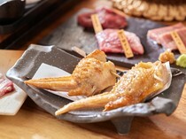 Mahoroba Irori Okinawa Branch_Chicken Wings of Ise Akadori with Matsutake Mushroom - Slowly grilled using Tosa binchotan charcoal, enhancing the rich flavor of Ise Akadori chicken.